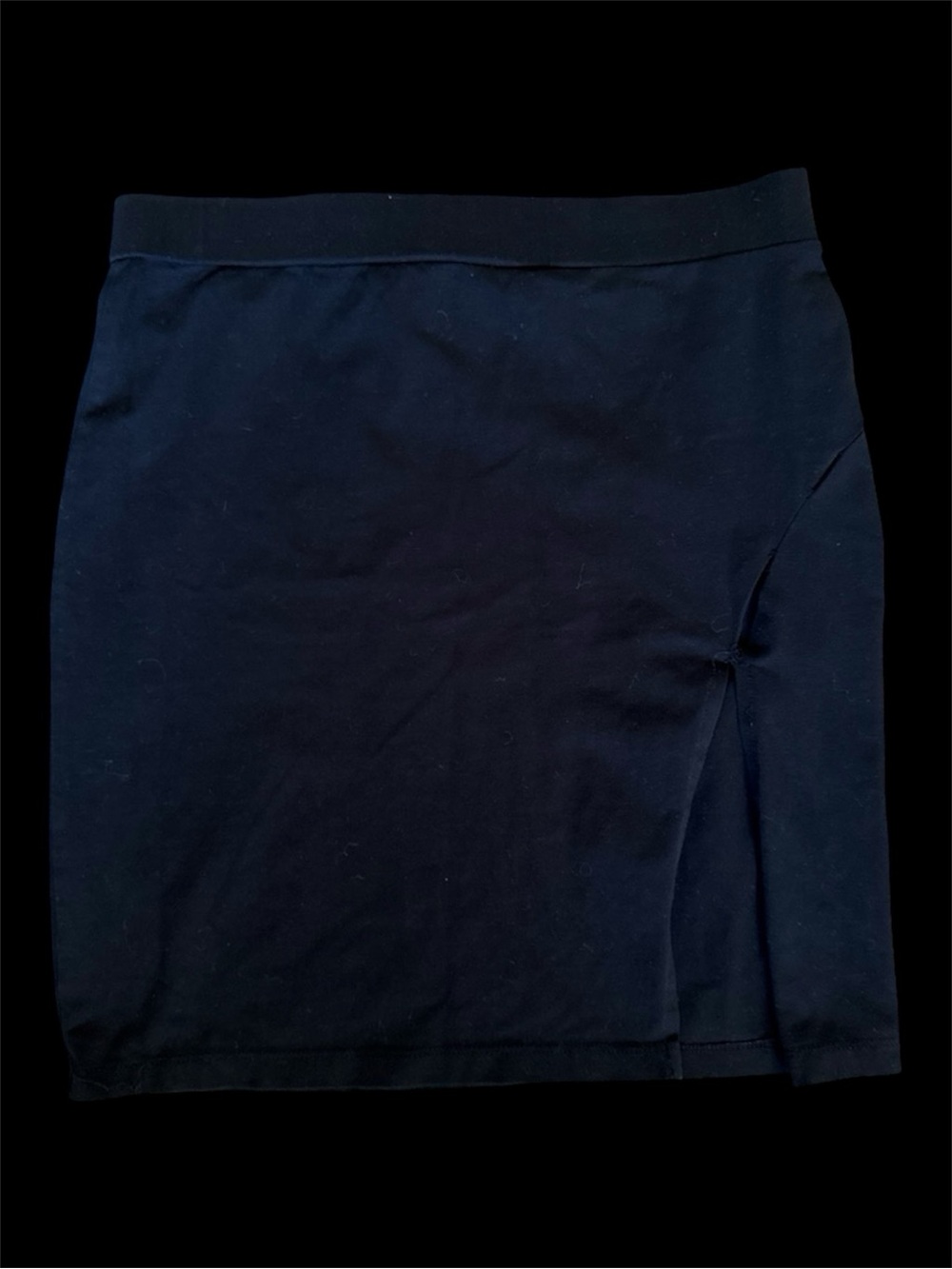 Black mini skirt with side slit